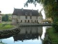 View of the Old Priory and River Bourde
